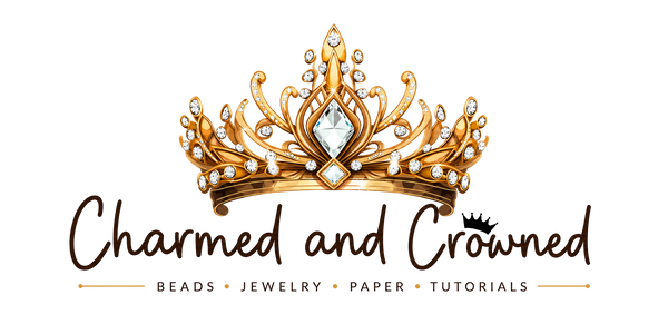 A gold tiara illustration with clear gemstones above the text 'Charmed and Crowned' and smaller text 'BEADS • JEWELRY • PAPER • TUTORIALS' on a white background.
